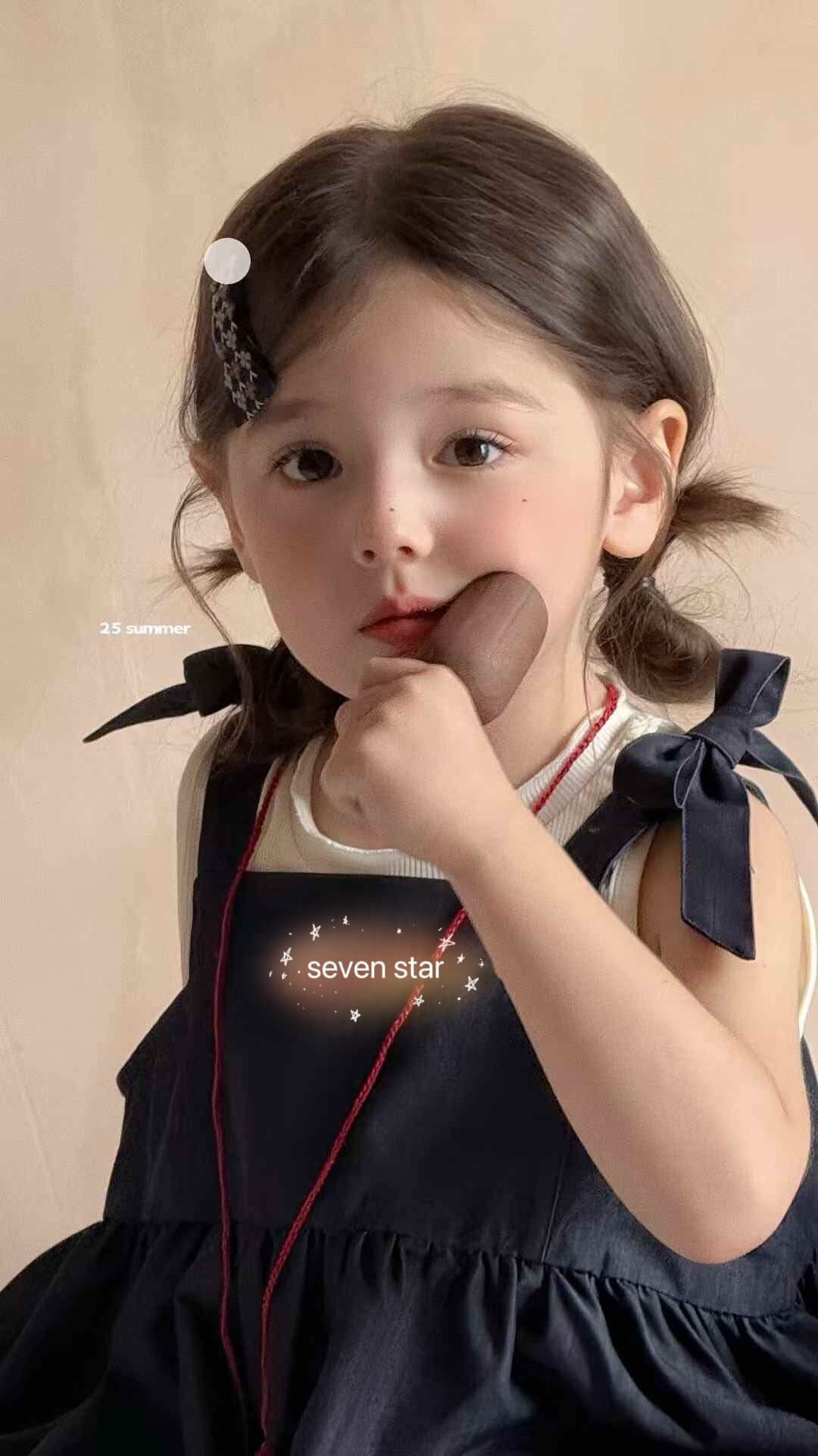 牛仔蝴蝶结上衣和牛仔裤套装