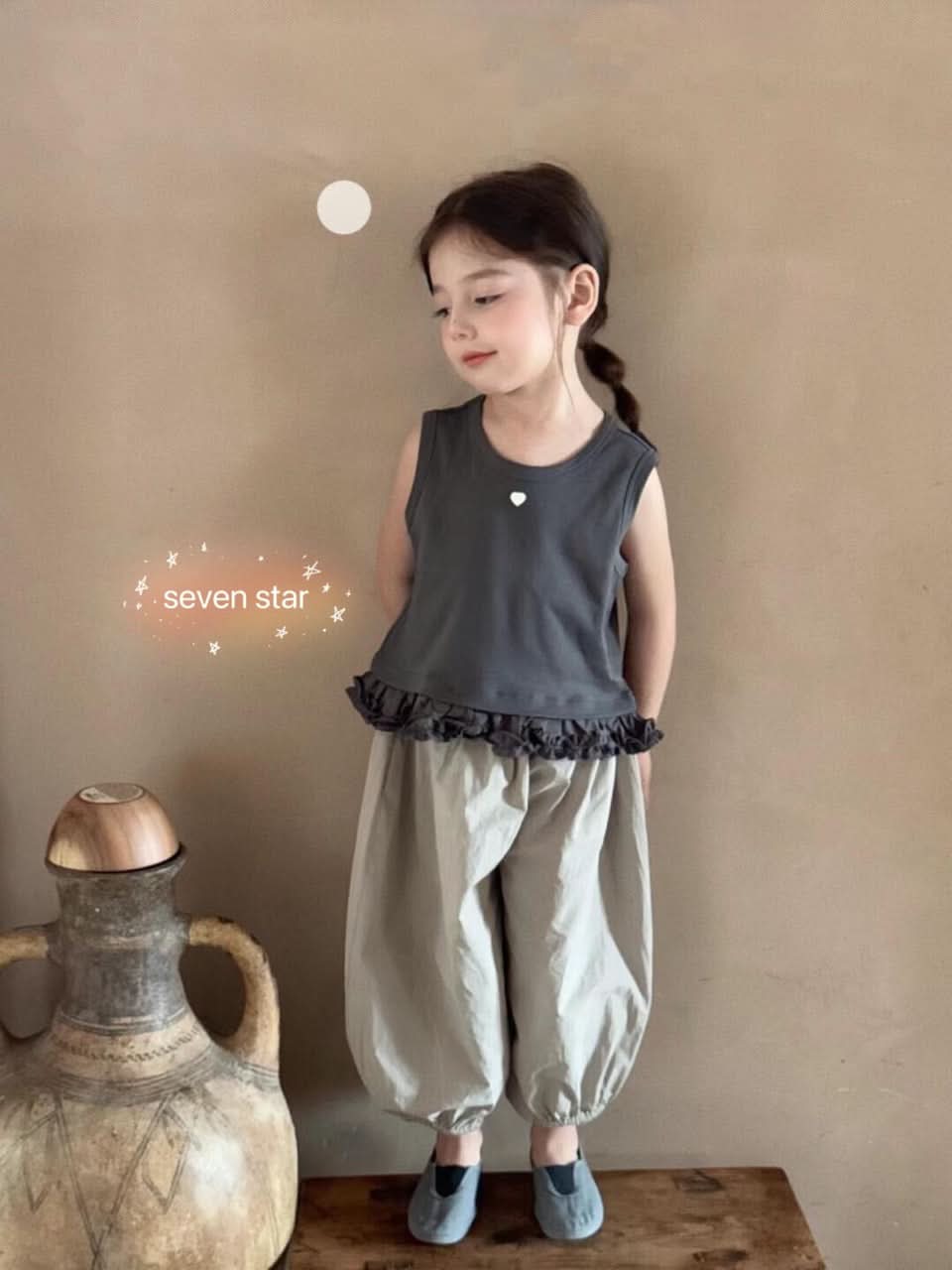 Ruffle Hem Sleeveless Top